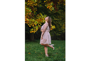 Beautiful young woman in a pink, a Nature Photo by Red Hot Chili Pepper Shop
