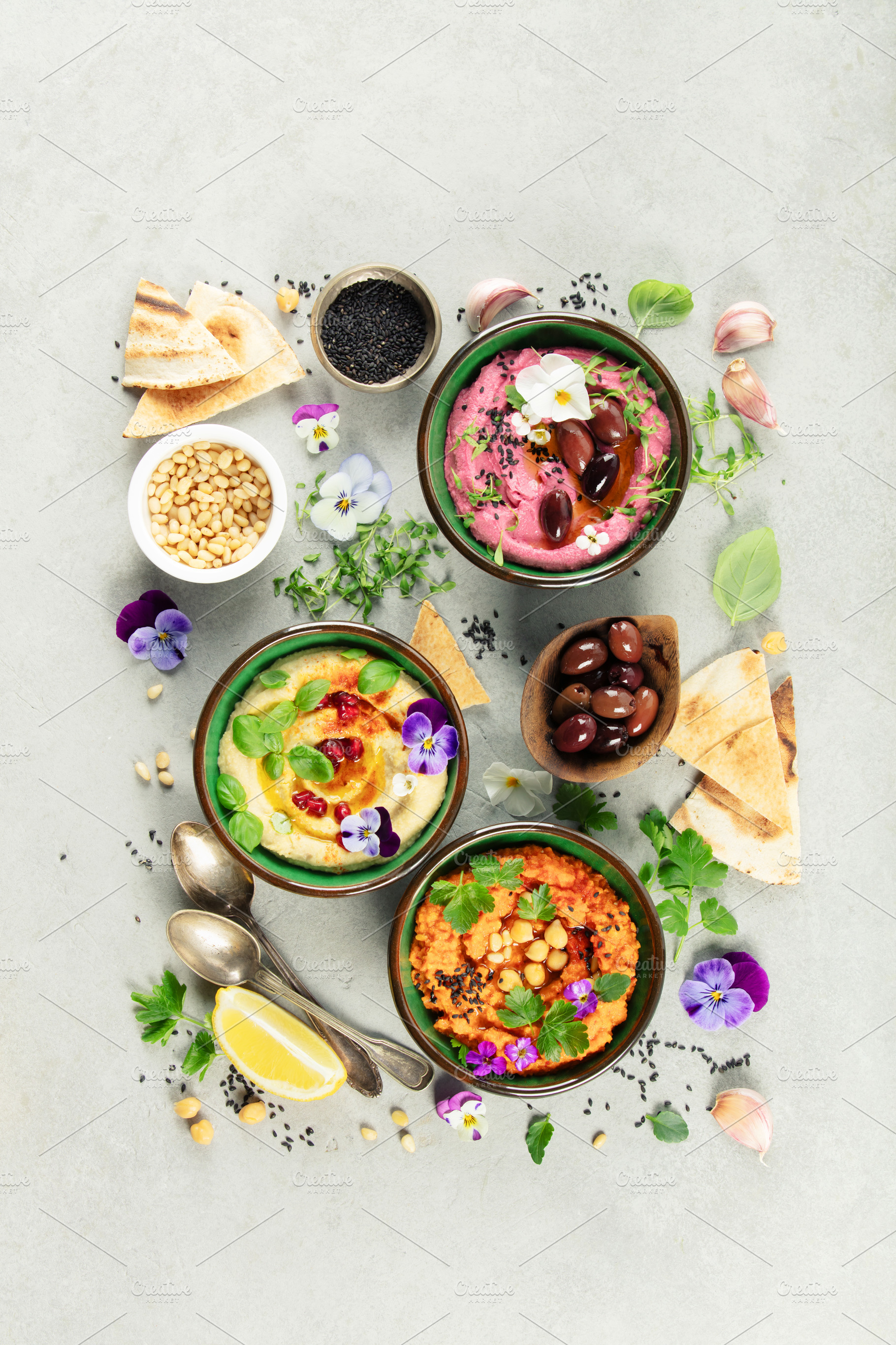 Gourmet Hummus Trio with Fresh Ingredients and Edible Flowers, a Food & Drink Photo by Natalia Klenova's Shop
