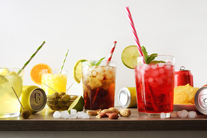 Several glasses with soft drinks of different flavors isolated b, a Food & Drink Photo by Davizro's Market