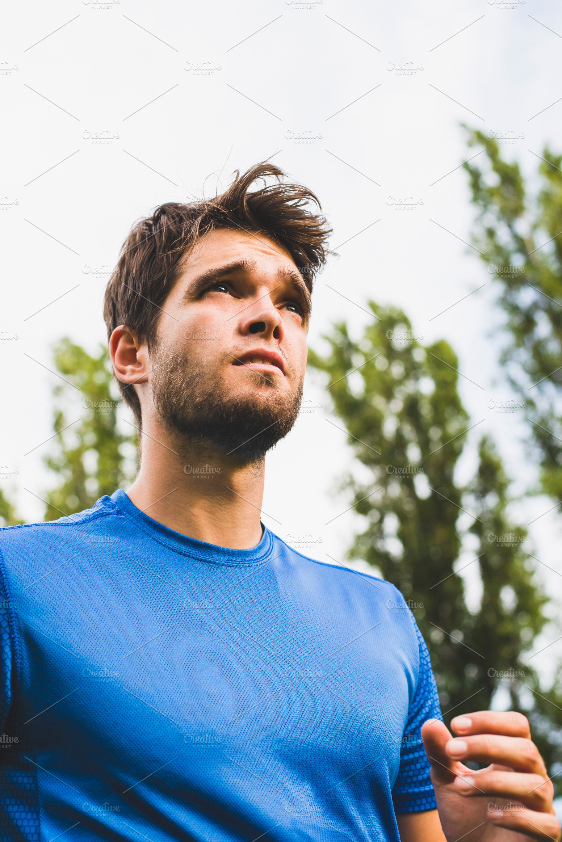 Closeup of attractive young man wit stock photo containing man and young, a Sports & Recreation Photo by José Luis Agudo