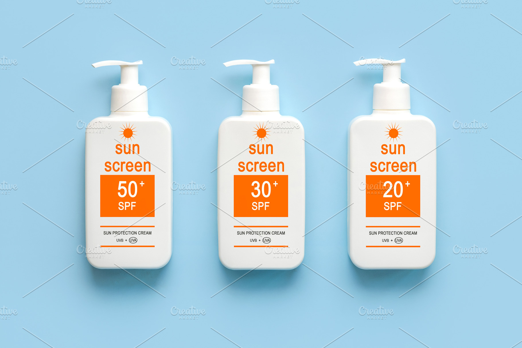 Top view of bottles of sunscreen, a Health & Medical Photo by esthermm