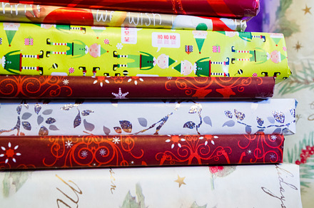 Pile of christmas presents containing christmas, presents, and books