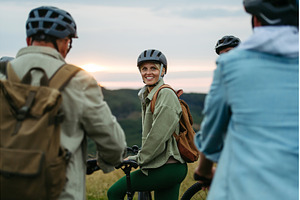 Happy woman during family biking, a Sports & Recreation Photo by HalfPoint