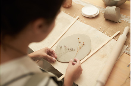 Woman doing pottery with floral, an Arts & Entertainment Photo by Sergey Mironov's store