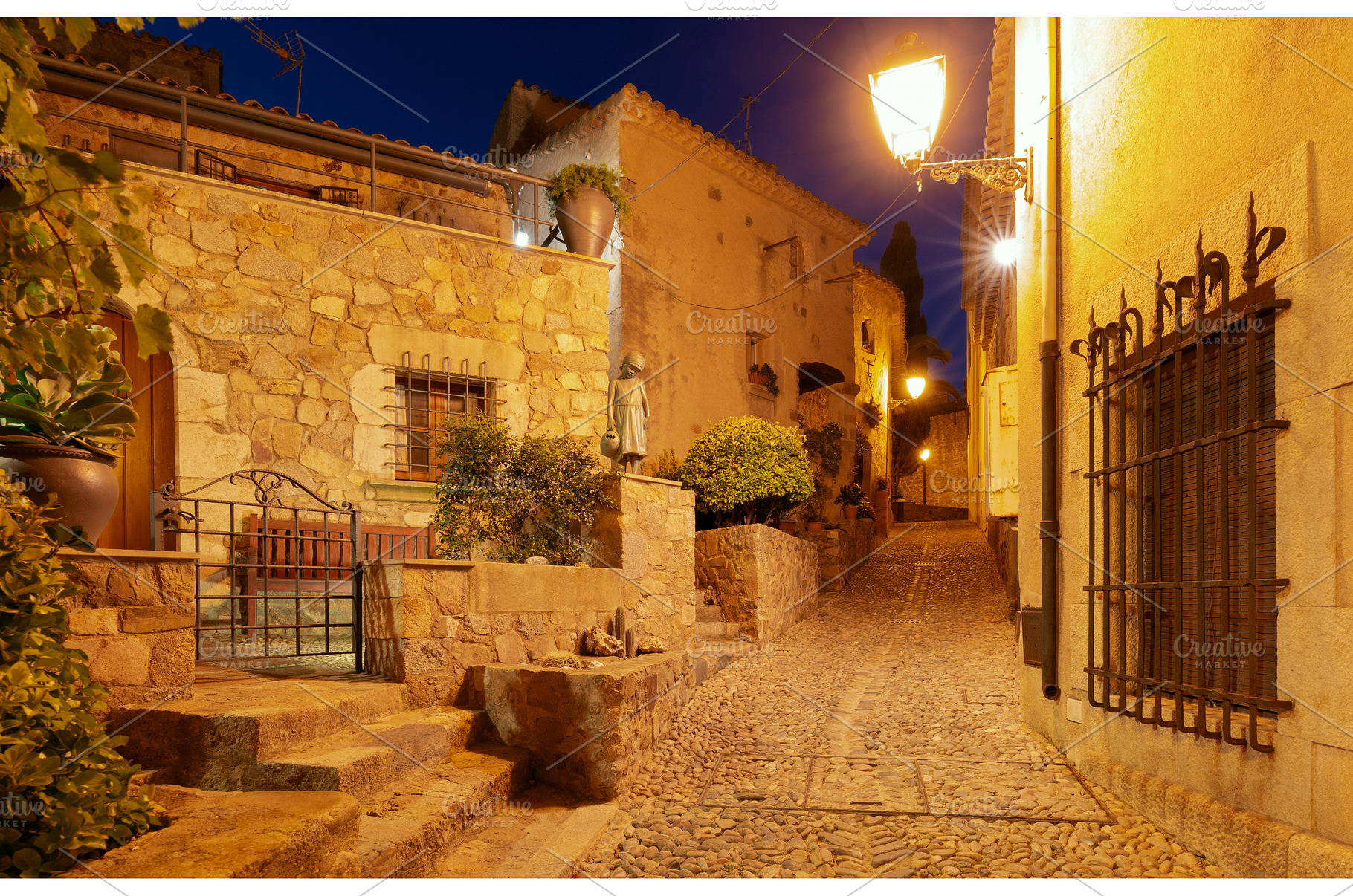 Night street in old town of Tossa de, an Architecture Photo by kavalenkava