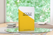 Mockup book in stylish living room, a Household Mockup by Daniel Megias (Thumbnail 1 of 2)