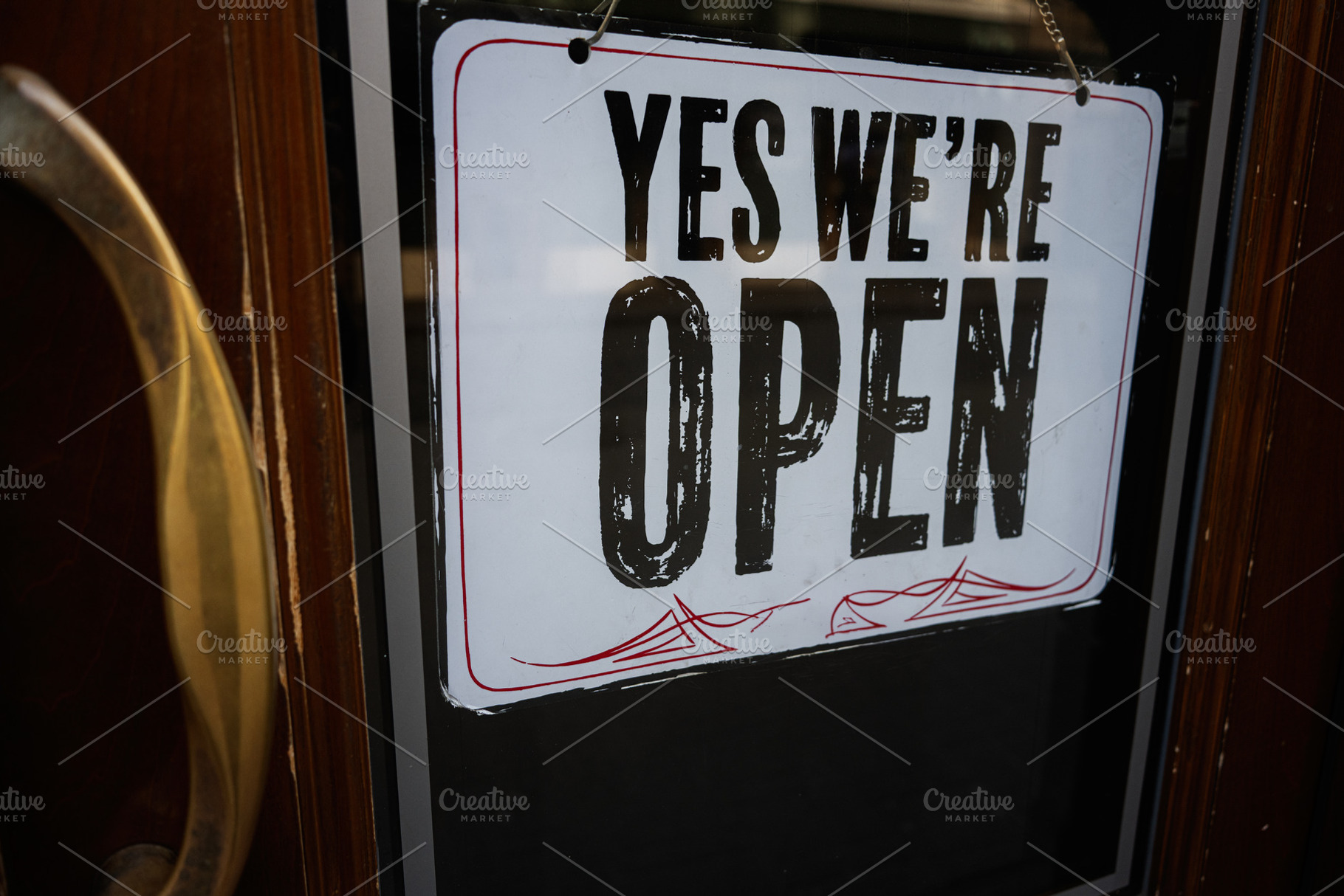Open sign displayed on a door indicating that the shop is welcoming customers, a Photo by AS photostudio