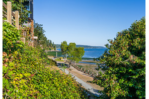 Hotel and wide beach at Langley on, a Nature Photo by Backyard Stock