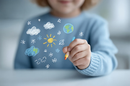 Student shares ideas through colorful drawing