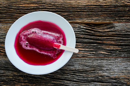 Melted fruit bar on white plate, a Food & Drink Photo by 1miromiro