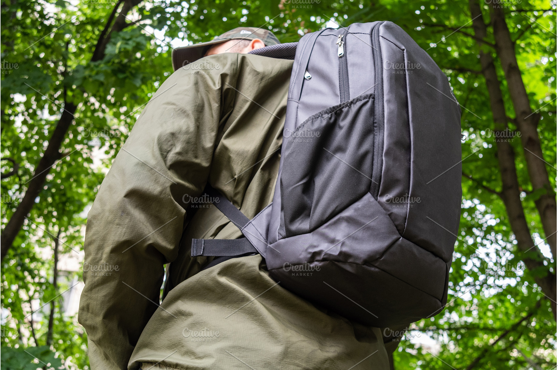 A man with a city backpack. A man, a Person Photo by Stockphoto by vzwer