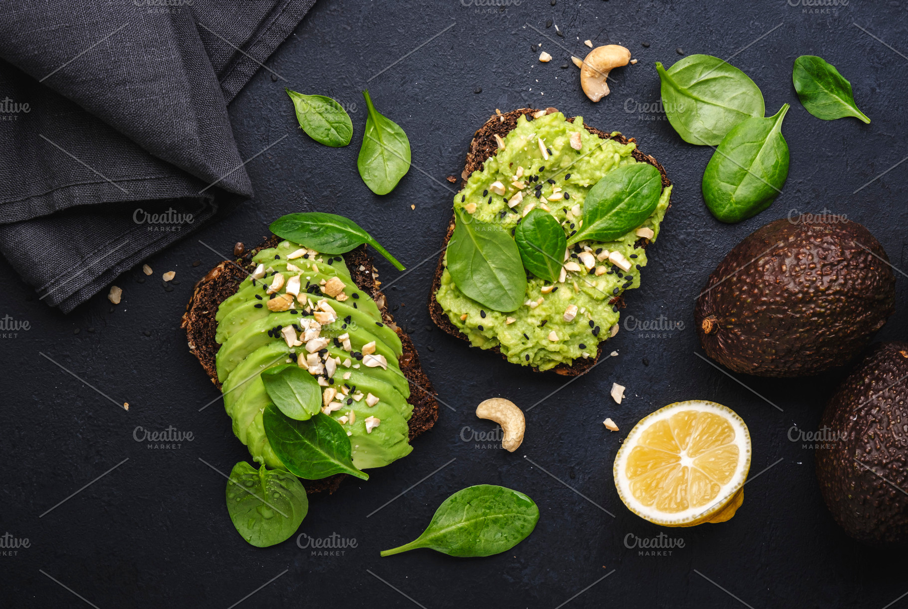Avocado sandwich or toast on rye bread with spinach, crushed cas, a Food & Drink Photo by 5PH