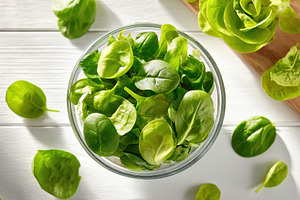 Fresh green salad leaves in a glass bowl, a Food & Drink Photo by AlyaAnd