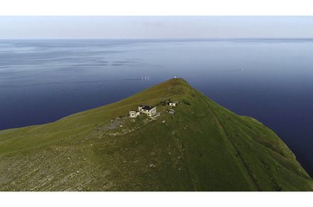 Houses on top of sea cape. Shot, an Architecture Photo by Media Whale Stock