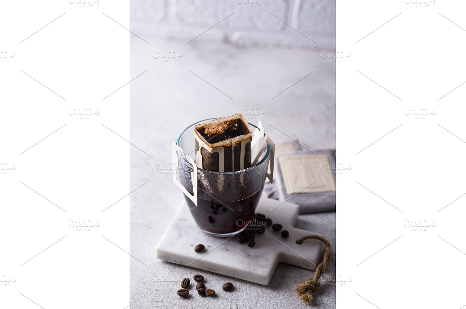 Freshly brewed drip coffee in glass, a Food & Drink Photo by Yulia Furman