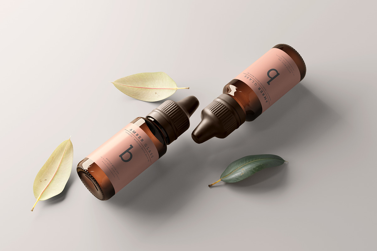 Amber Glass Dropper Bottle Mockups, a Cups & Container Mockup by pmvch (Photo 20 of 20)