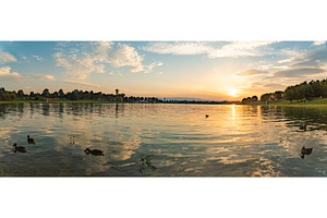 Lake schwarzl sunset panorama, a Nature Photo by MadPhotos