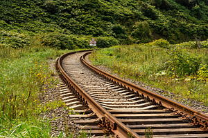 Curving railway track cutting, an Industrial Photo by Elena Vagengeim