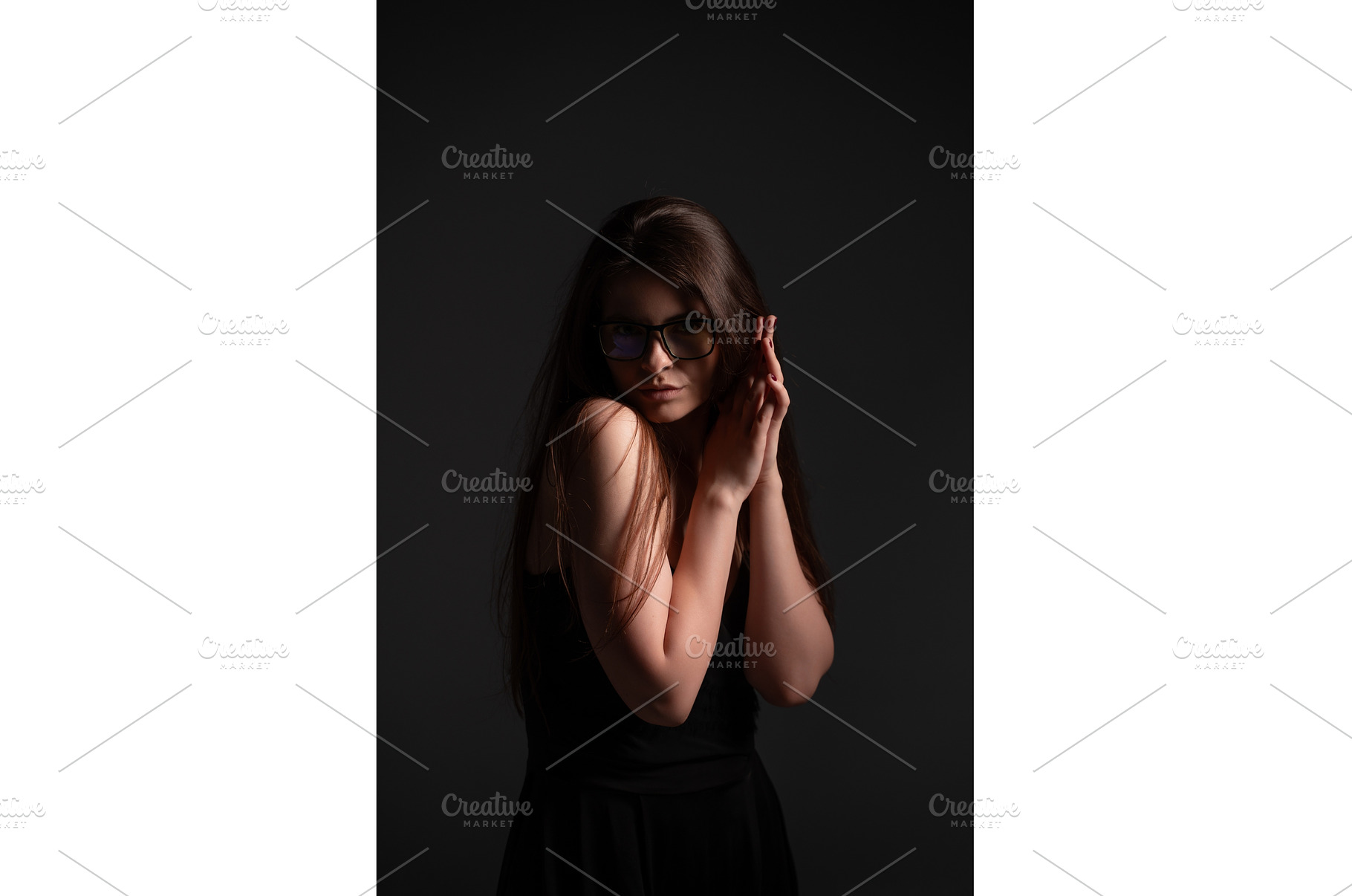 Woman posing wearing glasses, hands, a Person Photo by volodymyrshtun13795