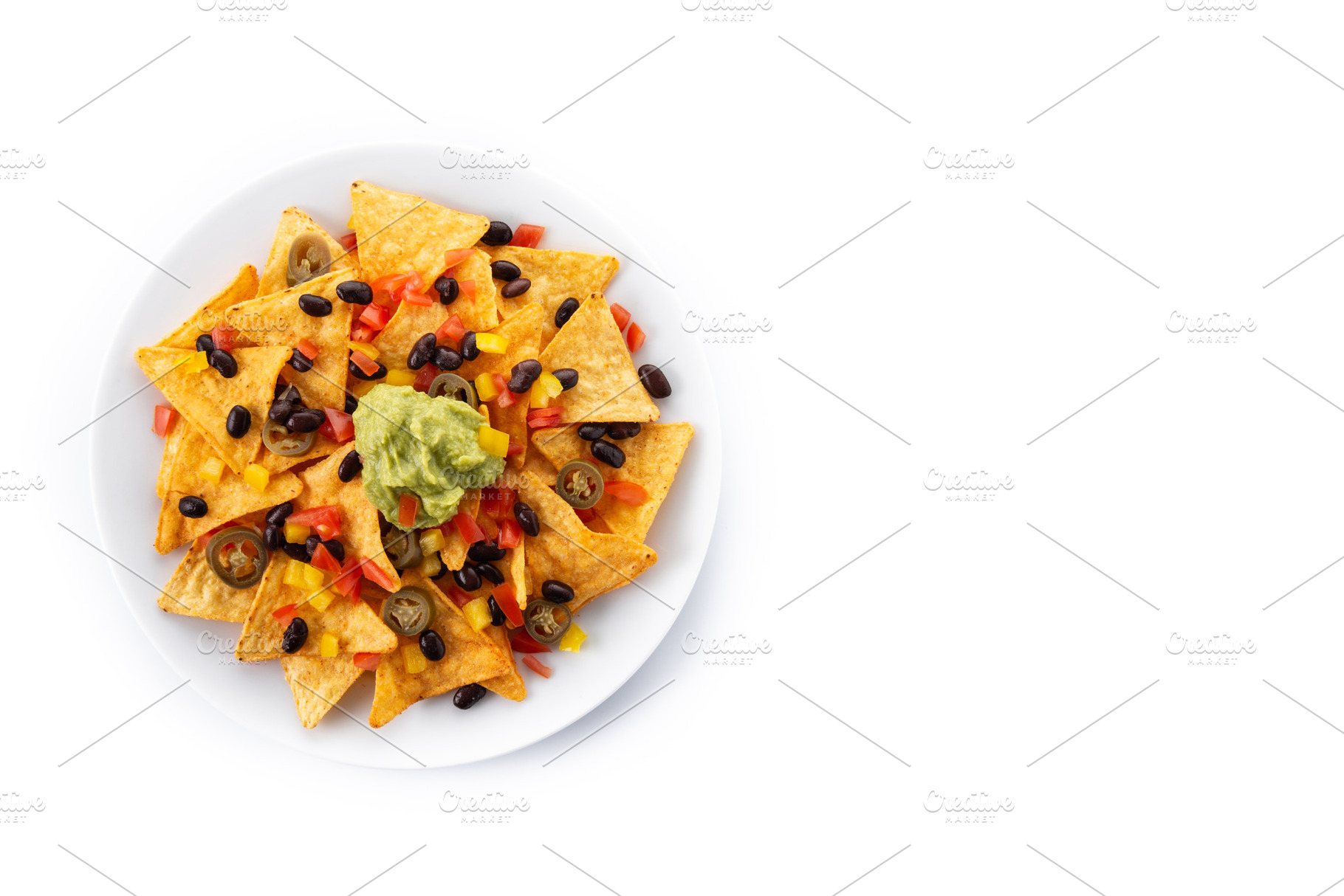 Mexican nachos tortilla chips with black beans, guacamole, tomato and jalapeno, a Background Photo by etorres69