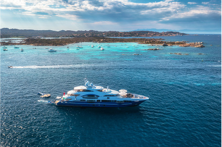 Aerial view of modern yacht sailing, a Nature Photo by den-belitsky