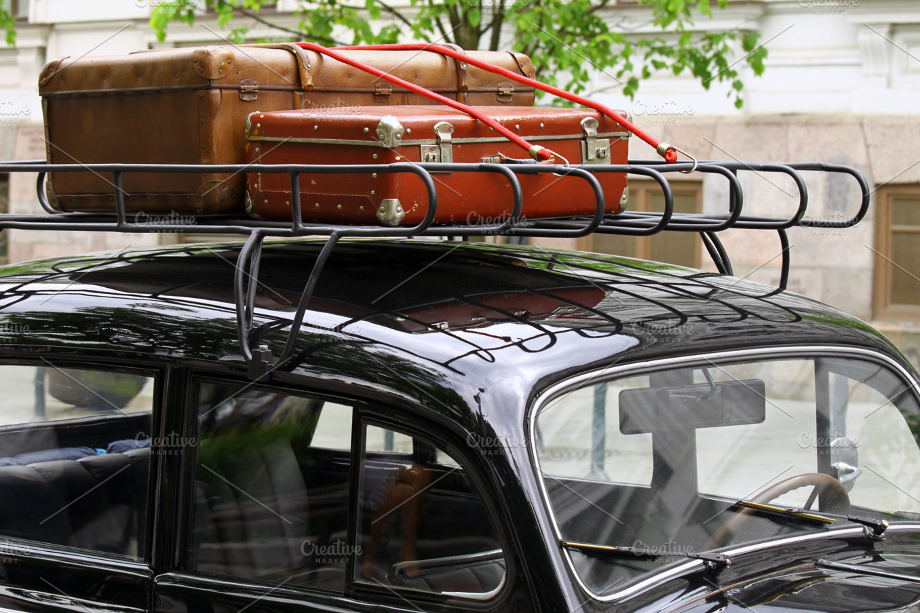 Vintage suitcases on the car roof, a Transportation Photo by BOOCYS