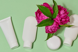 Top view of cosmetic tubes without labels in white packaging and, a Beauty & Fashion Photo by ndanko