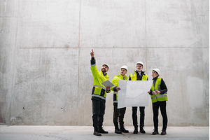 Team of engineers and construction, a Person Photo by HalfPoint