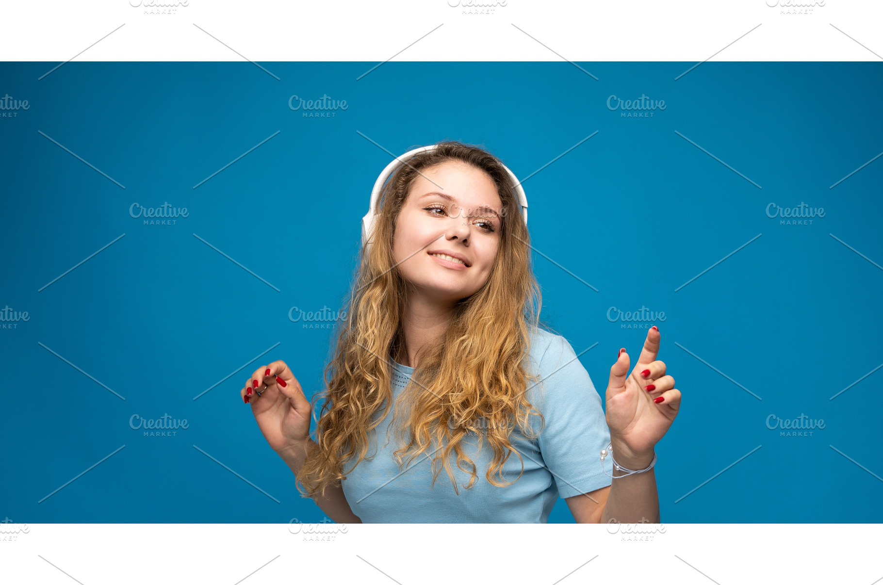 Cheerful young woman wearing blue t, a Person Photo by volodymyrshtun13795