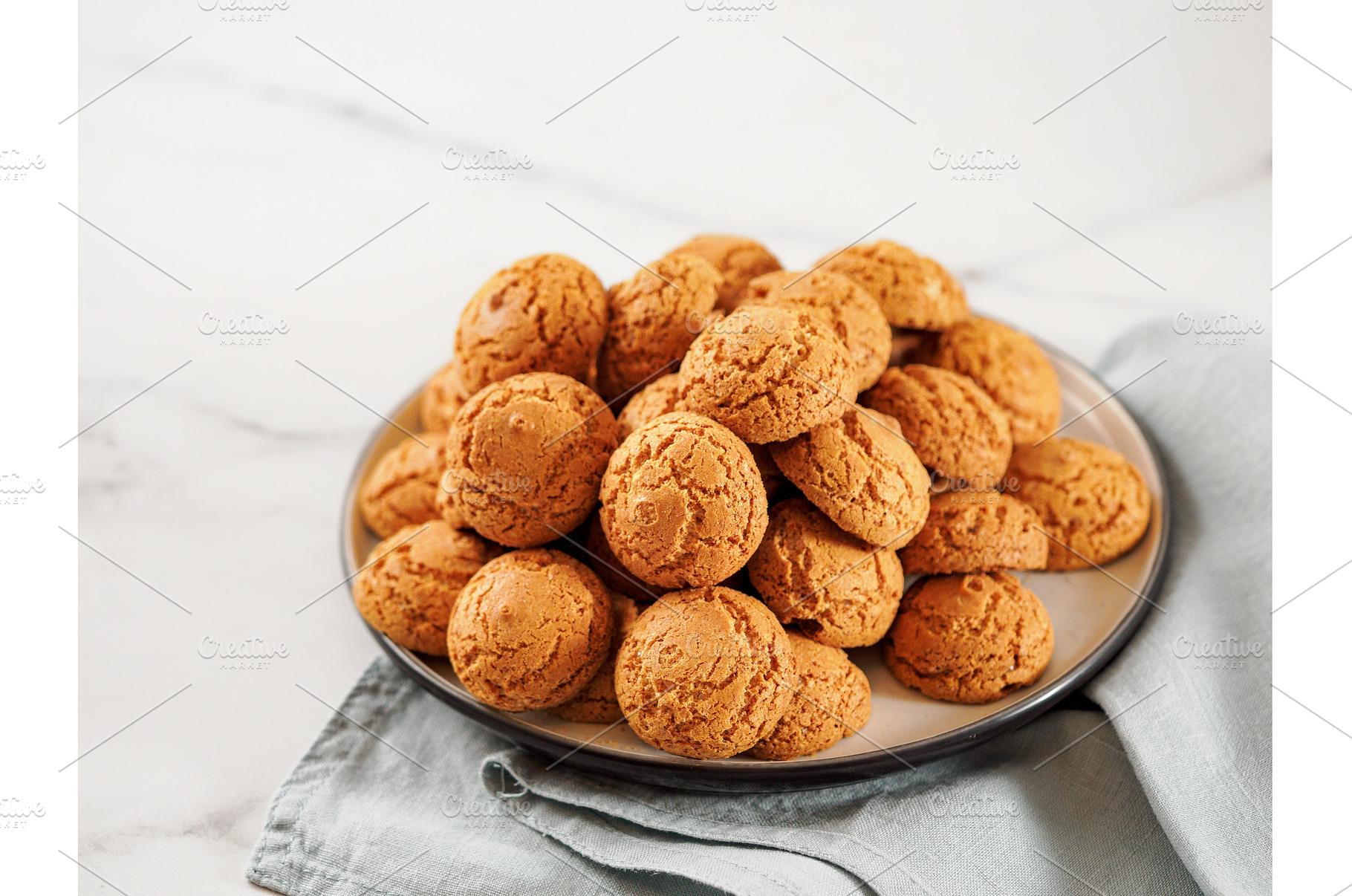 Plate of cookie amaretti on white, a Food & Drink Photo by Fascinadora