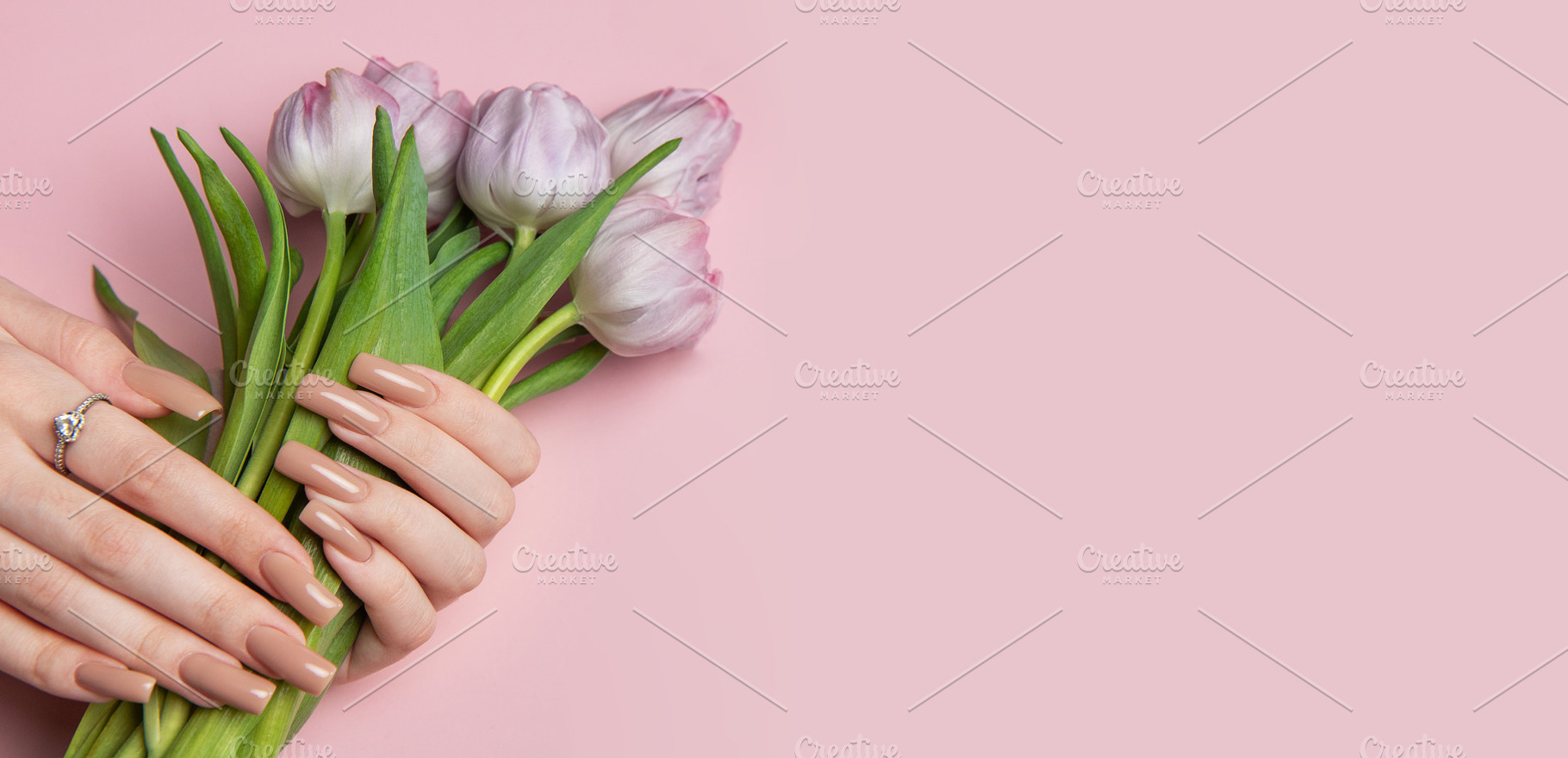 Woman hands with perfect manicure holding beautiful bouquet of p, a Beauty & Fashion Photo by Olena Rudo