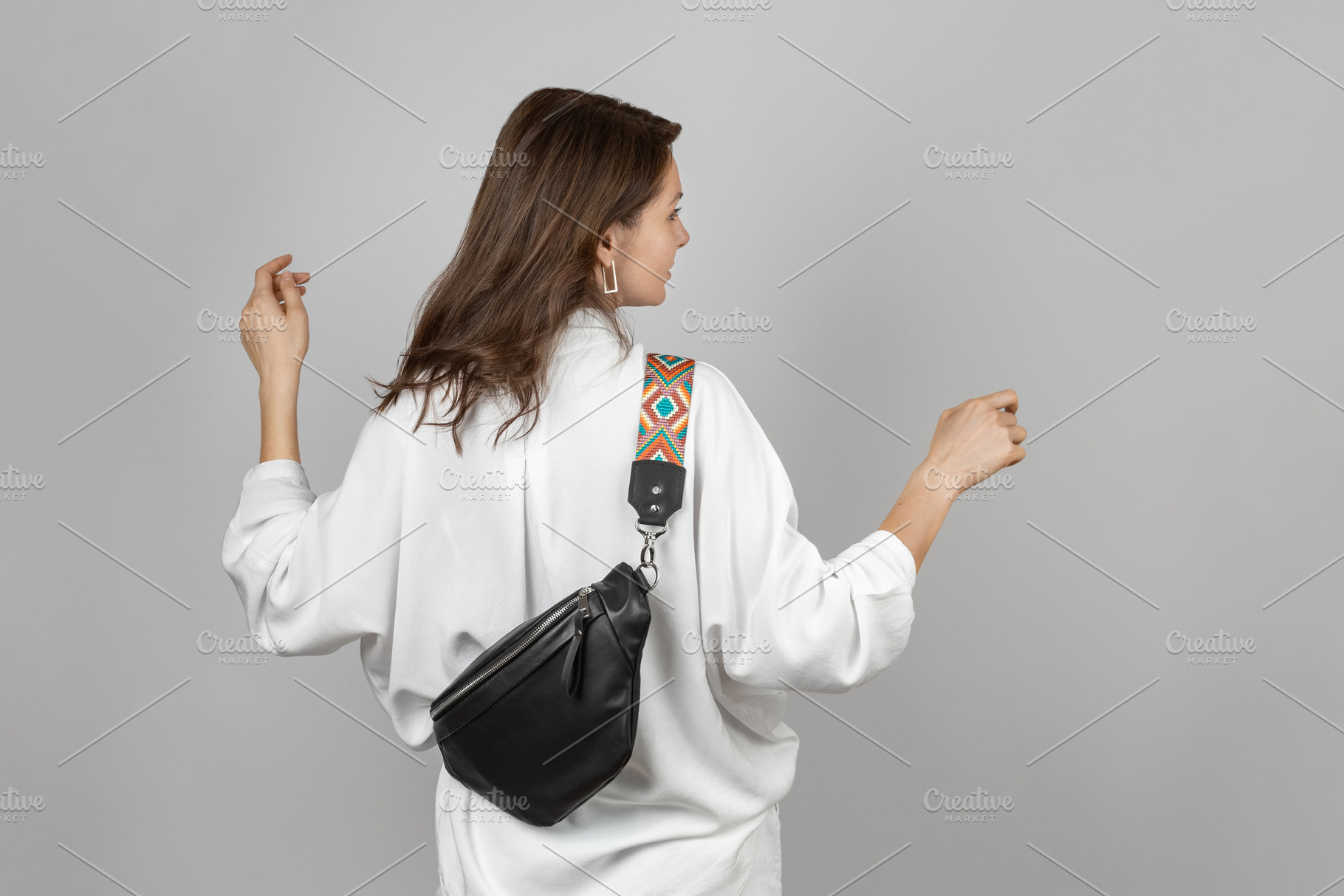Woman with Black Crossbody Bag, a Person Photo by Andriana Syvanych