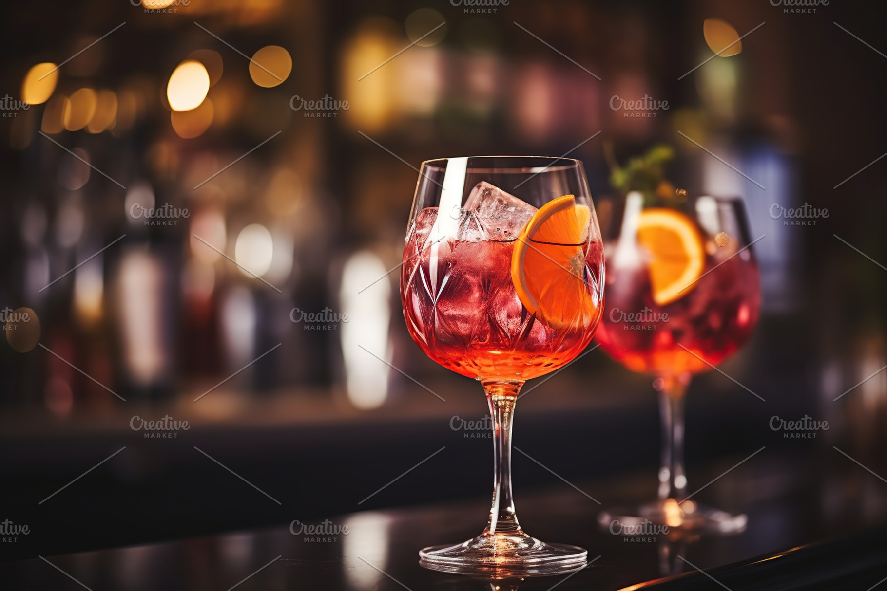 Alcohol cocktail in wineglass on bar table, a Food & Drink Photo by AlyaAnd