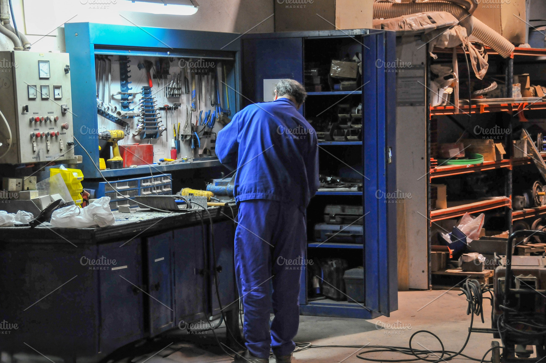Industrial Technician Working at Organized Workshop Bench, an Industrial Photo by Davizro's Market