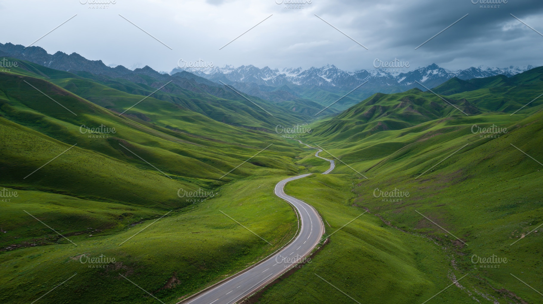 Curvy road in green hills, a Photo by Beautiful things