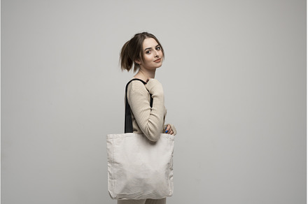 Brunette young girl holding linen, a Person Photo by volodymyrshtun13795