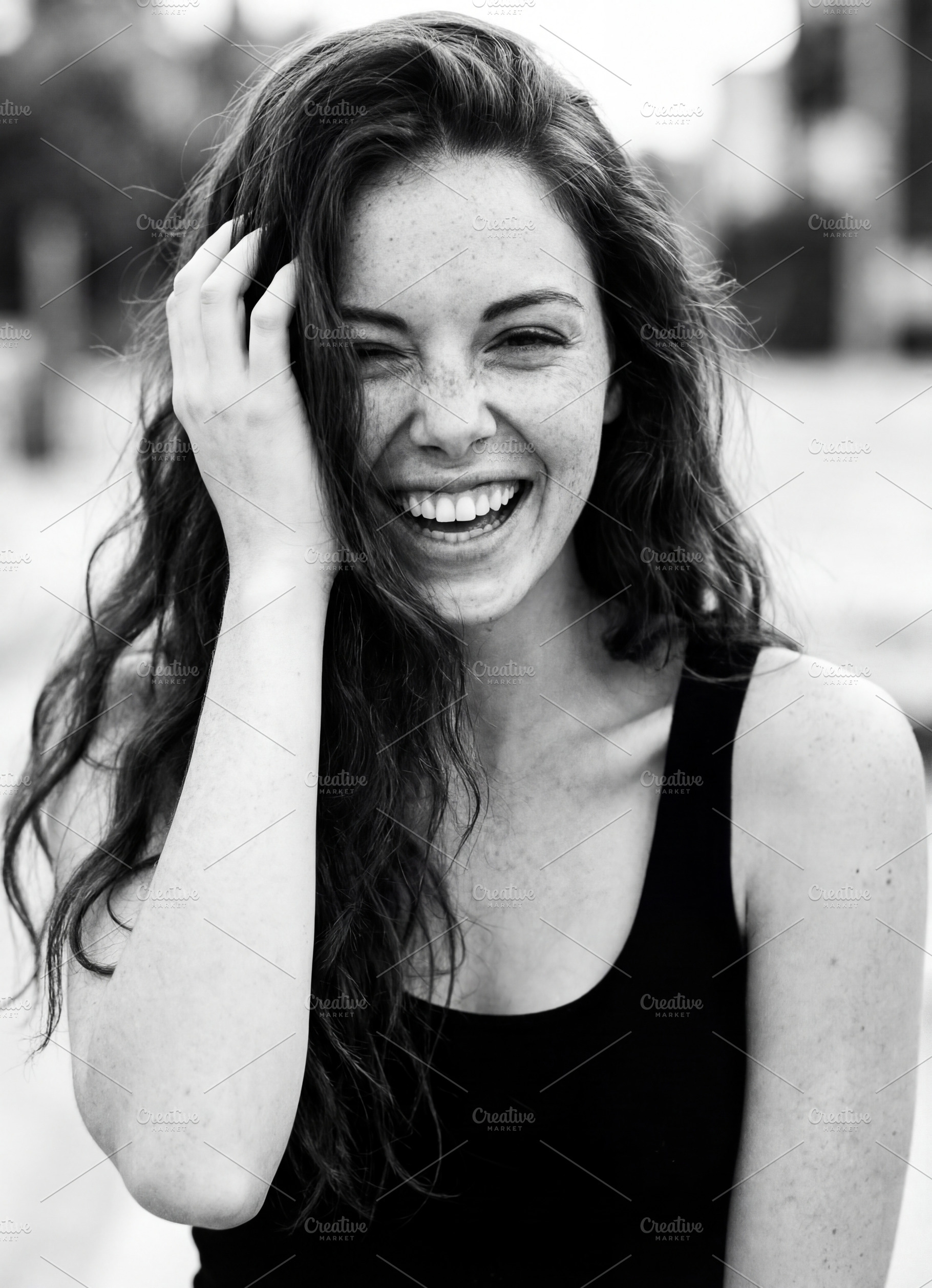 Freckled Young Woman Laughing B&W, a Person Photo by Virgo Studio