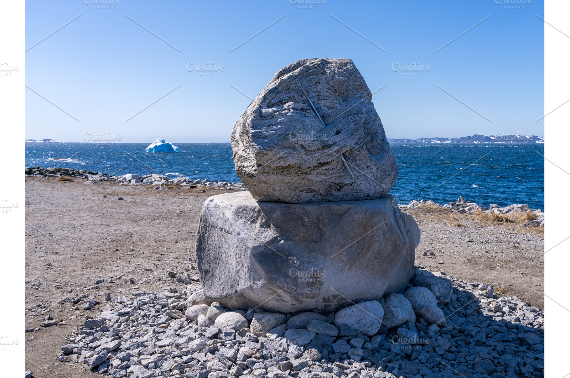 Needle inserted through rock by, a Nature Photo by Backyard Stock