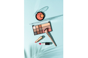 Make up products on blue background., a Beauty & Fashion Photo by Nadia-nb