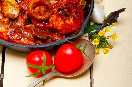 fresh seafoos stew on an iron skillet, a Food & Drink Photo by keko64