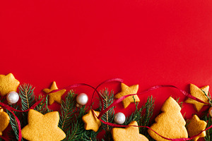 Christmas gingerbread cookies with pink baubles and evergreen br, a Photo by Sonjachni