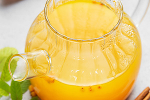 Hot sea buckthorn tea with orange mint cinnamon, a Food & Drink Photo by Olena Rudo