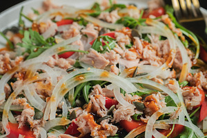 Fresh Tuna Salad with Onions and Cherry Tomatoes. Italian Mediterranean Cuisine, a Food & Drink Photo by Budarinphoto