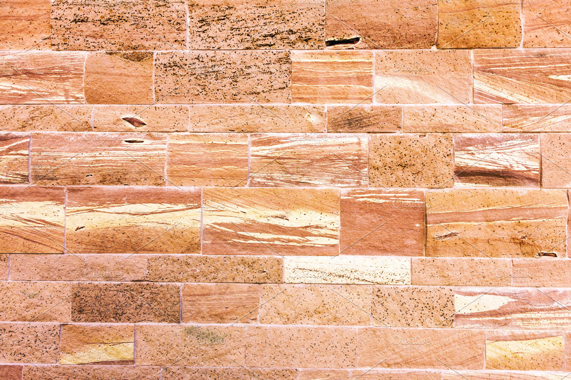 Textured red stone wall background, an Abstract Photo by BOOCYS