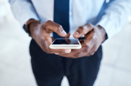 Black man hands , phone screen and digital communication with 5g connection. Writing, social media scroll and email typing business employee outdoor networking online on technology and internet, a Photo by Peopleimages.com