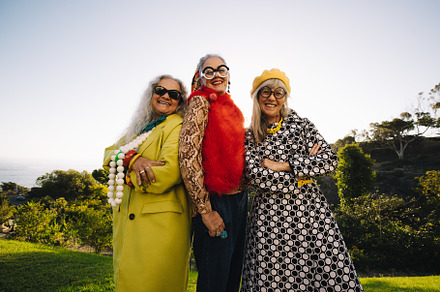 Mature eccentric women smiling happily while standing in a park, a Person Photo by Jacob Lund