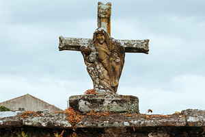 Ancient stone cross with a mossy rel, an Architecture Photo by Perpis