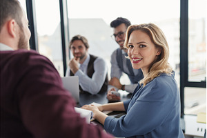 Group of coworkers discussing, a Business Photo by HalfPoint