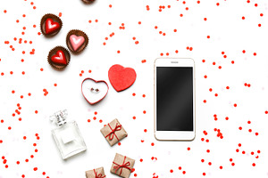 Flatlay with confetti & smartphone