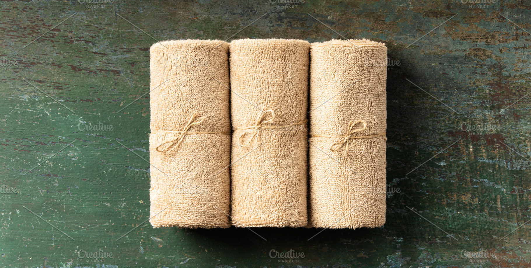 Rolled Natural Towels on Rustic Surface for Spa or Wellness Conc, a Food & Drink Photo by Natalia Klenova's Shop